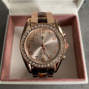 Women’s rose gold cuff watch